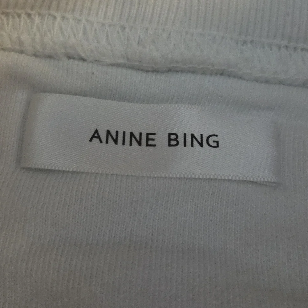 Anine Bing White Crewneck Sweater with Black Text